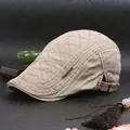 Beige quilted flat cap for men and women with metal side detail and adjustable buckle strap - Adjustable / Khaki