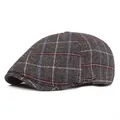 Detailed macro shot of vintage plaid newsboy cap showing grey woven fabric texture - One Size / Light Gray