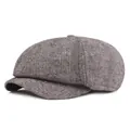 Detail of grey newsboy cap showing grey herringbone fabric and classic octagonal design - One Size / Light Gray