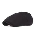 Close-up of a classic black beret cap featuring solid color texture and precise stitching - Adjustable / Black