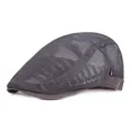 Detailed macro view of dark grey mesh fabric and stitching on a breathable beret hat - Adjustable / Gray