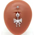Silberner Bauchnabelpiercing mit Schmetterlingsschleife und Herz-Edelstein aus Stahl - Silberner Schleifen-Stil / Silber