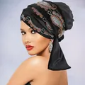 Elegant black velvet turban for women featuring colorful rhinestone paisley patterns - Black