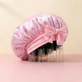 Pink satin hair bonnet with cherry leaf prints featuring a wide elastic bow and large capacity - Pink Jasmine