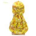 Silky durag featuring yellow and brown camouflage pattern with long ties and wide tail - Adjustable / Yellow Camo
