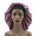 Dusty pink satin bonnet with a black elastic wide band on a mannequin head - Dusty Pink