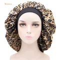 Brown leopard print satin sleep cap with a wide black elastic band for hair protection - Adjustable / Leopard Print