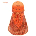 Vibrant orange silk durag with classic black paisley patterns and long adjustable straps - Orange