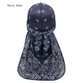Navy blue durag with paisley pattern featuring long tails and silky finish on white model - Navy Blue