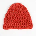 Detail of red hollow knit mesh hat showing crochet texture and breathable grid pattern - Red
