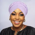 Detailed view of the braided lilac turban cap featuring front cross-pleat texture - Light Purple
