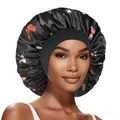Detail of black satin sleep bonnet featuring vibrant butterfly prints and wide elastic band - Black