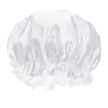 Close-up of white satin sleep cap featuring ruffled elastic edge and glossy texture - White