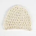 Detailed close-up of cream crochet hair net cap showing hollow mesh texture and border - Off White