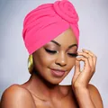 Detailed view of pink pleated turban hat featuring a decorative spiral top knot design - Rose Red