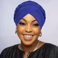 Close-up of royal blue turban headwrap featuring a stylish braided knot design - Sapphire Blue