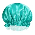 Detail view of lake blue satin sleeping cap with elastic ruffled edges and silk texture - Lake Blue