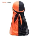 Silky durag featuring a stylish orange and black color-block design with long tails - One Size / Orange And Black