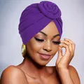 Detail of deep purple turban hat featuring a 3D rose knot and elegant pleated texture - Purple