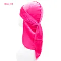 Side view of rose red velvet kids durag with long ties and soft glossy texture - One Size / Rose Red
