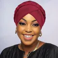 Detailed view of wine red braided turban hat showing premium fabric and cross-wrap design - Burgundy