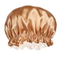 Detail of golden brown satin sleep cap showing the elastic band and white lace trim - Khaki