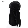 Detail of premium black velvet durag with long ties on a model mannequin head - One Size / Black