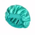 Satin sleep cap for hair care in bright mint green with a wide elastic headband - One Size / Lake Blue