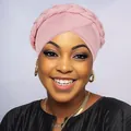 Front detail of pink braided turban hat showing woven cross design and soft fabric texture - Dusty Pink