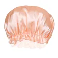 Detail view of champagne satin hair bonnet showing smooth texture and ruffled elastic band - Champagne