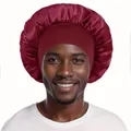 Deep red satin sleep bonnet with wide elastic band for hair care worn by a model - One Size / Burgundy