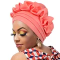 Modischer korallenrosa Turban-Hut mit plissierten Rüschen aus weichem Strickstoff - Champagner