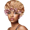 Detail of champagne gold satin sleep cap with pink lining and ruffled edges for hair care - 30cm / Khaki And Pink