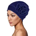 Detail of navy blue turban hat featuring a large 3D layered fabric flower and soft knit texture - One Size / Navy Blue