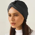 Close-up of black knot turban headscarf showing elastic jersey fabric and twist detail - One Size / Black