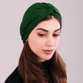 Detail of dark green twisted turban cap showing crisscross design and soft fabric texture - One Size / Dark Green