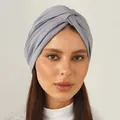 Detail of grey twisted turban hat with cross-knot design and soft stretch fabric - One Size / Gray