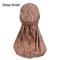 Detailansicht eines khakifarbenen Durags mit Distressed-Stoff und langen Bändern - Einheitsgröße / Dunkles Khaki