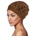Women's brown turban hat featuring a large 3D flower with yellow contrast edge stitching - One Size / Coffee