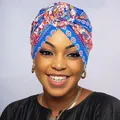Detail of vibrant paisley floral turban with intricate twisted flower knot design - Sapphire Blue