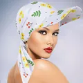 Detailed view of floral sun turban hat with cherry print and long adjustable ties - Yellow Flower