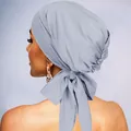 Detailed back view of a light blue turban featuring a large elegant bow and pleated texture - Light Gray