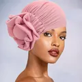 Detail of pink pleated turban with large decorative 3D flower and soft knit fabric - One Size / Dusty Rose