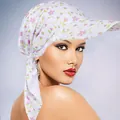 Close-up of a women's floral sun hat with purple flower prints and silk texture - Purple Flower