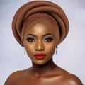 Detail of caramel layered turban showing premium fabric texture and structured wrap design - Coffee