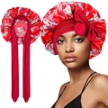 Detail of red floral satin bonnet with long wide straps and a decorative front bow - Single Layer / Red Floral