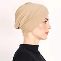 Detail of the smooth beige muslim hijab under-cap showing fabric texture and seamless edges - One Size / Khaki