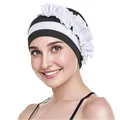 Dettaglio del cappello a turbante bicolore con eleganti balze bianche decorative - Taglia unica / Nero con volant bianchi