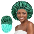 Close-up of double-layered satin hair bonnet showing the smooth green silk texture - One Size / Green