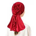 Rear view of red milk silk turban with large 3D flower and ruffled pleated hem details - Red